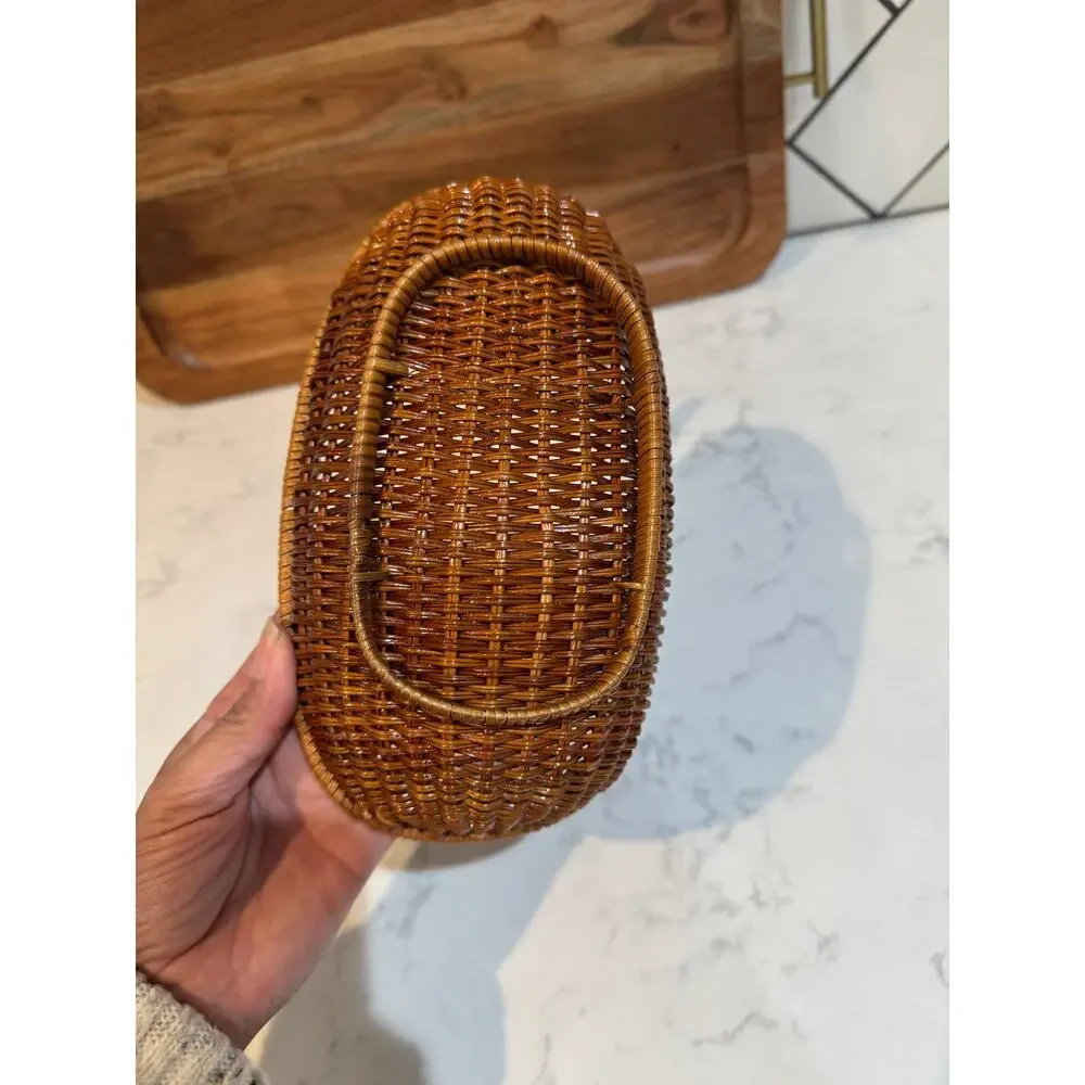 handwoven rattan duck basket elongated oval bowl design integrated duck head